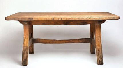 Fototapeta premium A rustic wooden dining table with a natural oak finish, featuring thick, sturdy legs.