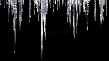 icicles hanging on a dark background