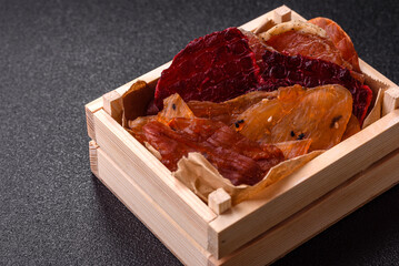 Jerky, dried meat in the form of slices with salt, spices and herbs