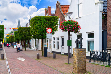 A charming street view in Joure, Netherlands, featuring historical architecture