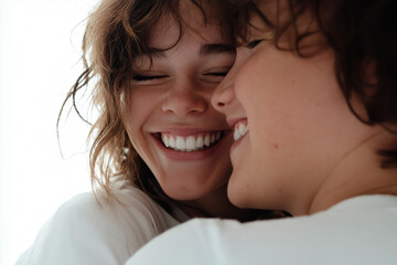 Two young women laughing and enjoying a moment of friendship. Their genuine smiles and warm emotions create a sense of happiness and harmony, reflecting the beauty of true relationships.