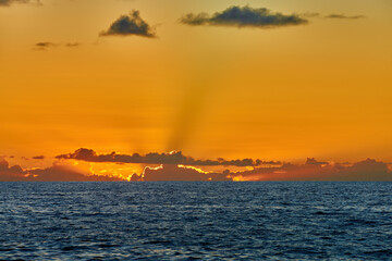 Hawaii Scenic Sunset over the Ocean, Golden Sky with Majestic Cloudscape