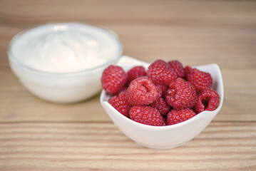 Greek yogurt with raspberries and coffee, healthy breakfast