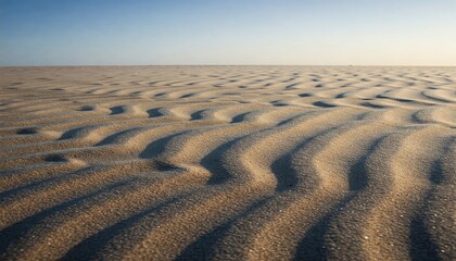 Textured pattern of sand and sky mixing blue and brown tones with soft lighting