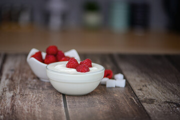 Greek yogurt with raspberries and coffee, healthy breakfast