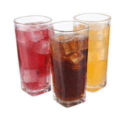 Soda water of different flavors with ice cubes in glasses isolated on white