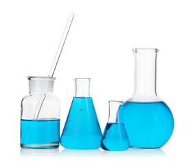 Laboratory glassware with blue liquid isolated on white