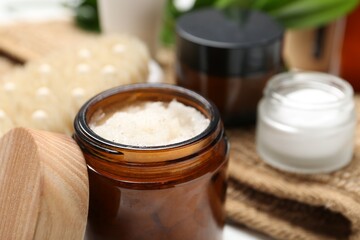 Different body care products on table, closeup