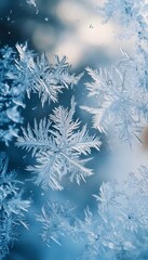 Close view of ice crystals forming intricate patterns on glass
