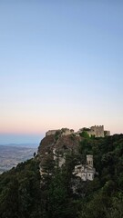 Fototapeta premium Castle on the hill and sunset
