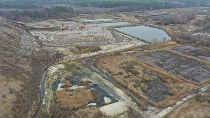Expansion of the landfill site. The landfill site is expanding into a swamp. Spreading of the...