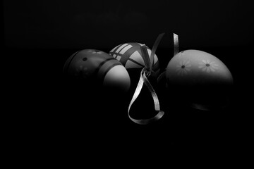 colored easter eggs on black background celebrate holy easter