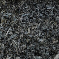Fototapeta premium Dark textured surface with wood chips and coal particles effect. Atmospheric background for design, graphics and art projects.