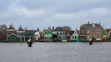 View of typical Dutch houses in Zaanse-Schans on the river bank