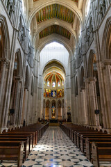 Fototapeta premium Almudena Cathedral in Madrid, a stunning blend of neoclassical, Gothic, and Romanesque styles. A sacred landmark with breathtaking interiors, a grand dome, and a rich royal history.