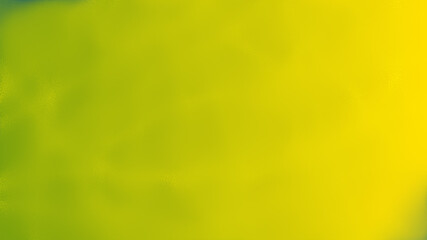 Abstract bright colors of yellow and green blending together in a fluid pattern