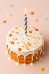 Delightful Birthday Cake with Colorful Sprinkles and a Lit Candle for the Perfect Celebration