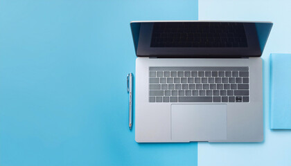 Fototapeta premium A flat lay of a laptop, pen and a notebook on a blue background. Generative AI