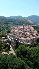 Aerial view of Sant'Agata dei Goti city in South Italy surrounded of Mountains and gree vegetation on Summer light