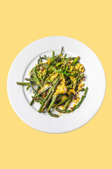 Fresh Wild Asparagus Scramble on a Minimalist Plate Showcasing Spring Ingredients