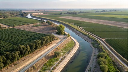 River Flowing Through Agricultural Valley with Irrigation Canals
