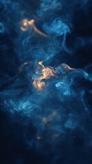 Swirling blue and golden smoke creates a mesmerizing abstract pattern in dark surroundings