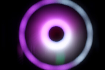 Abstract colored background. A glowing purple circle.