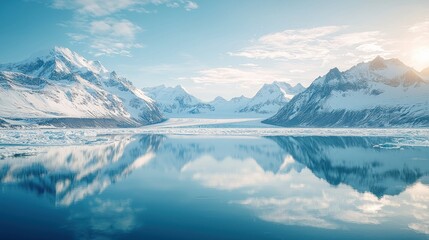 Arctic Snowy mountain range landscape reflecting in calm cold glacial waters