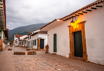 Charming cobblestone street in Villa de Leyva, Boyacá, Colombia with traditional colonial...