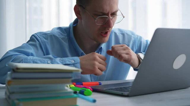 Man with flu and cold symptoms.
A guy has a sore throat.
The man coughs and holds his sore throat.
An office employee has a severe cough.
Businessman is sick at work.
A man has a sore throat