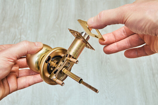 Mechanism of door knob and its brass components in process of being assembled.