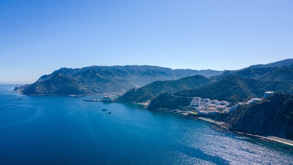 Explore stunning photos of Hamilton Cove, Catalina Island, featuring scenic coastlines, turquoise waters, and beautiful Mediterranean-style villas.