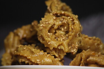 A close-up of sweet moroccan cookie known as Chebakia