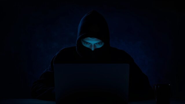 Cybercriminal in the Dark &ndash; Hooded Hacker Stealing Data Online