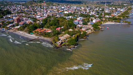 Aerial View of Tolu: Vibrant Coastal Town in Choco, Colombia with Stunning Beaches and Clear Waters