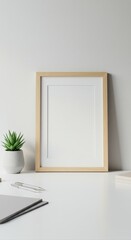 Minimalist Home Office Desk Setup with Blank Frame
