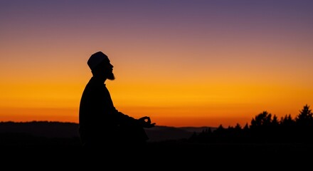 Serene Sunset Silhouette: A Man in Prayer