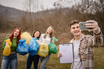 self portrait of young man activist volunteer hold clipboard