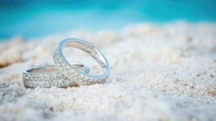 Wedding Rings on Beach Sand