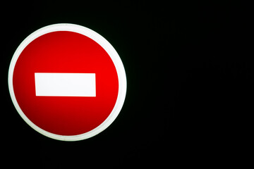 Traffic sign indicates no entry at night