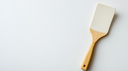 Clean new spatula as plaster tool isolated on white background with copy space