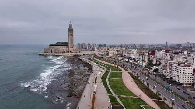 4K Aerial Zoom-Out Over Casablanca, Morocco - Hassan II Mosque and Coastal Cityscape