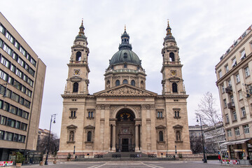 St. Stephen's Basilica dominating Budapest cityscape on cloudy day