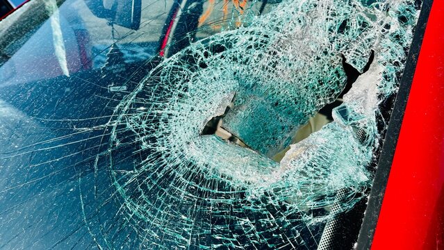close up broken windshield of car after accident . parking . copy space