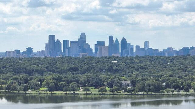 Dallas Skyline Parallax Shot Over White Rock Lake on a Partly Cloudy Day