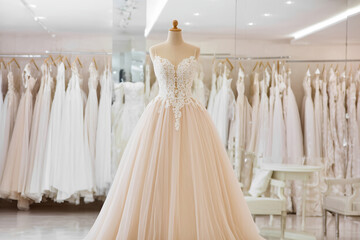 wedding dress hanging on hangers