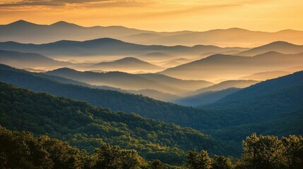 Obraz premium Scenic Sunset Over Mountain Range: Serene Nature Landscape with Rolling Hills and Misty Forests
