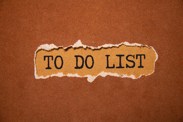 Hand with marker writing: To Do List: So Many Things.