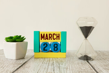 28 March calendar month text on wooden blocks. Calendar month concept
