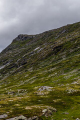 Majestic Rocky Mountain Range Under a Cloudy Sky Capturing the Essence of Nature's Beauty and Tranquility in Wilderness Landscape Photography